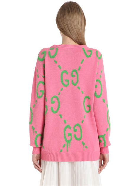 pink gucci sweater.